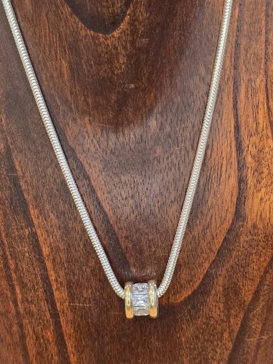 2 cadenas y un anillo